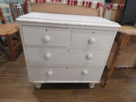 White painted 2 over 2 chest of drawers