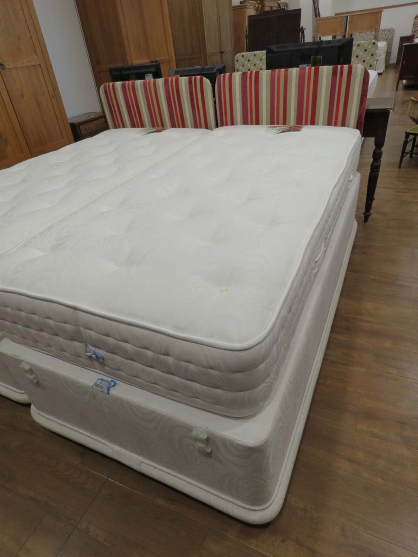 3ft single bed on divan base with striped fabric headboard