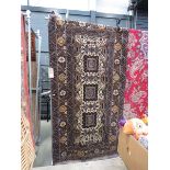 (2) Balouch carpet with geometric and floral pattern