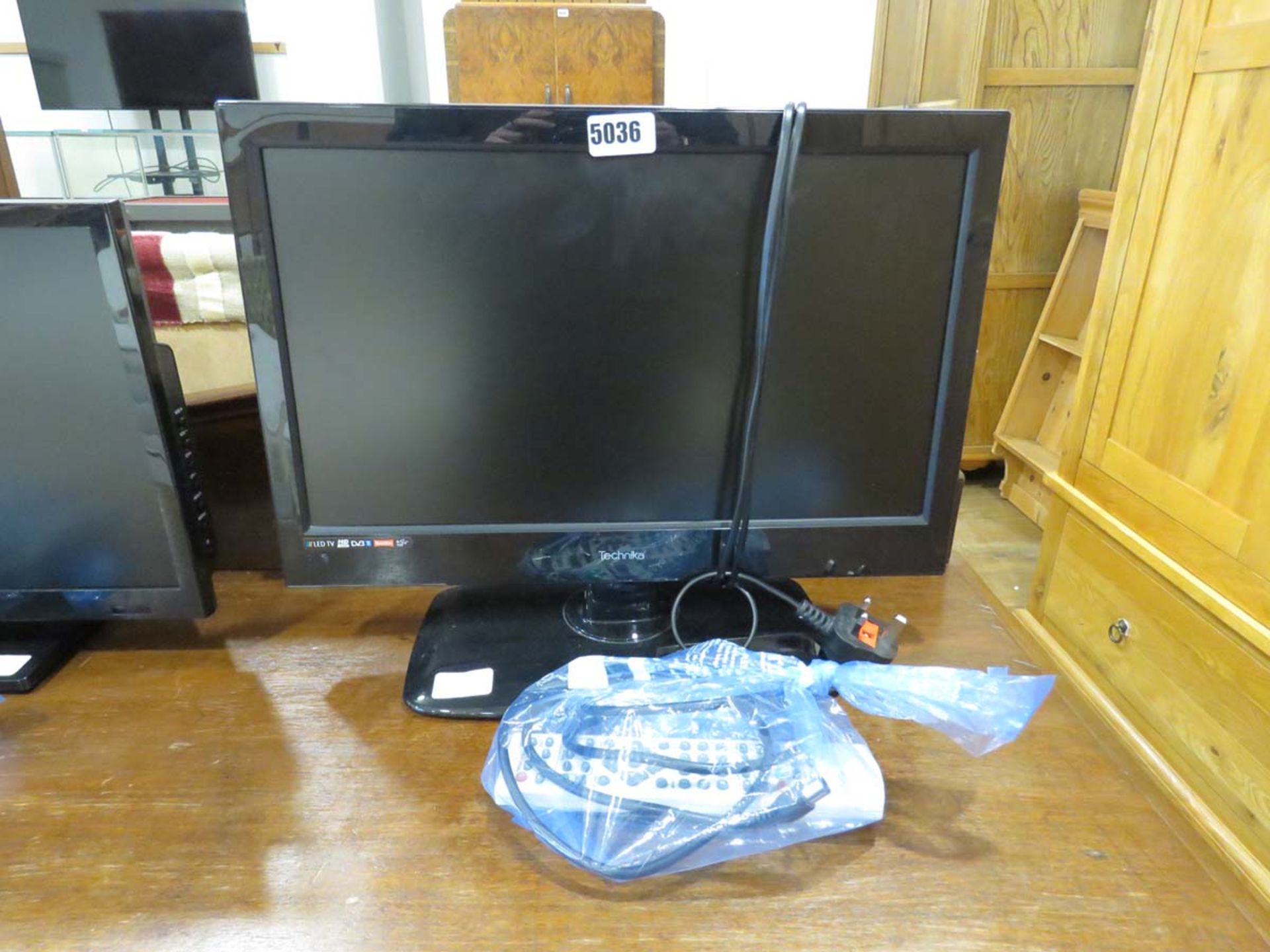 Small Technica flat screen TV with remote