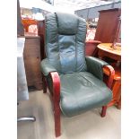 Green leather effect open arm chair