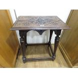 Occasional table with carved top