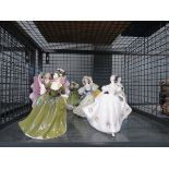 A cage containing a quantity of Royal Doulton lady figures