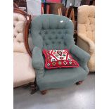 Green fabric button back armchair