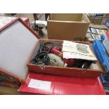 2 Boxes containing Vibro-Dox massaging machine and a box of national dolls