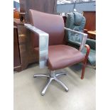 Brown leather effect and aluminium swivel arm chair