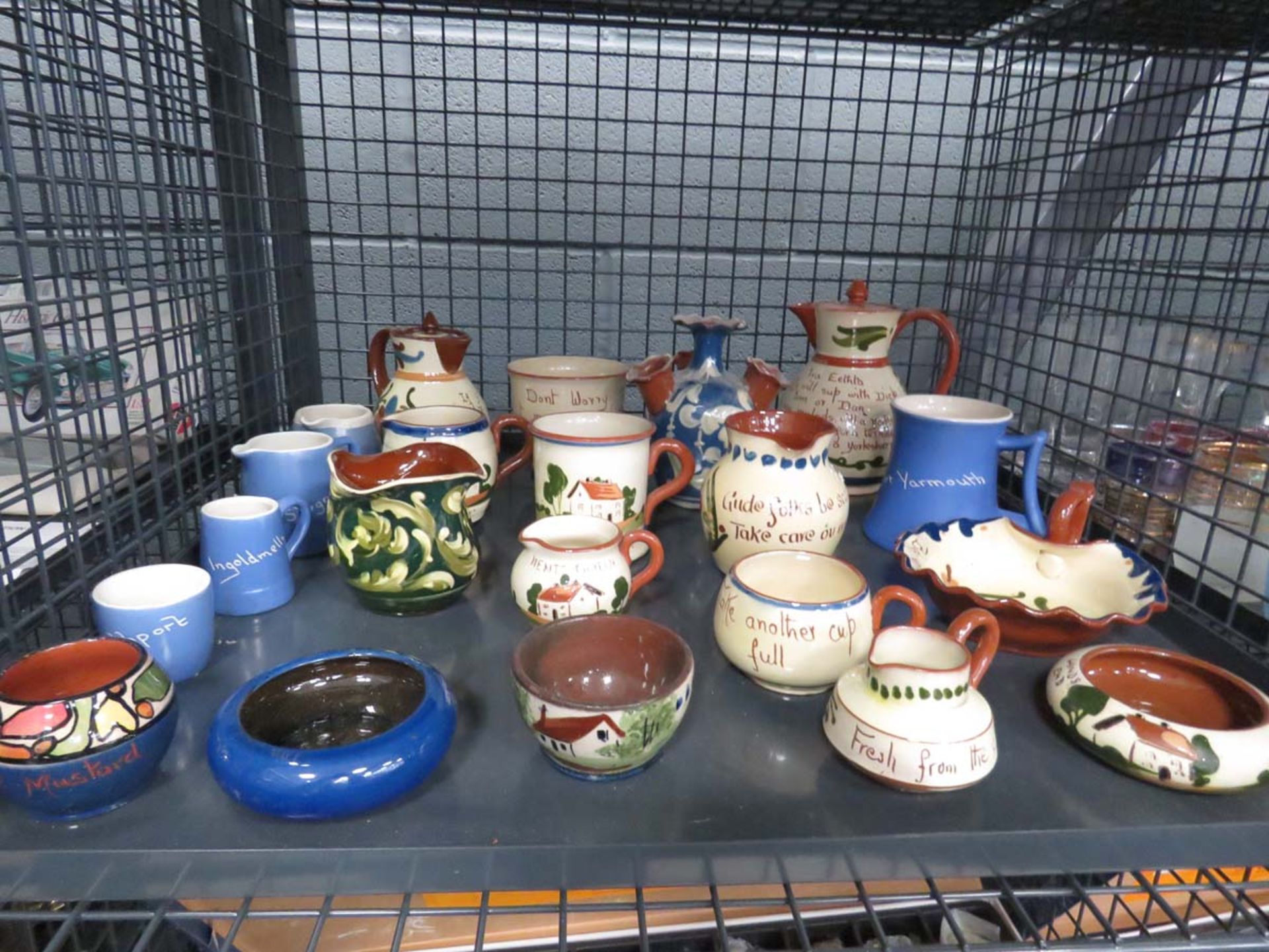 (4) Cage containing Devonshire and other souvenir pottery