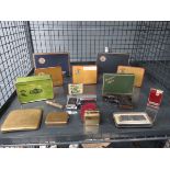 Cage containing players navy cut cigarette tins and lighters