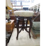 Upholstered adjustable stool