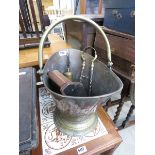 Brass coal scuttle, with a brush, coal tongs and a 1950s mantle clock