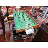 Table top football game, Oxford dictionary, vinyl records, Giles annuals and map