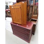 Pine single door corner unit and a dark wood chest of 3 drawers