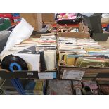 2 Boxes containing 7 inch vinyl records