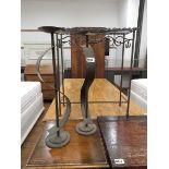 Pair of bent metal candle sticks and a bent metal hall table