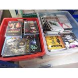 Two boxes containing a quantity of DVDs and CDs