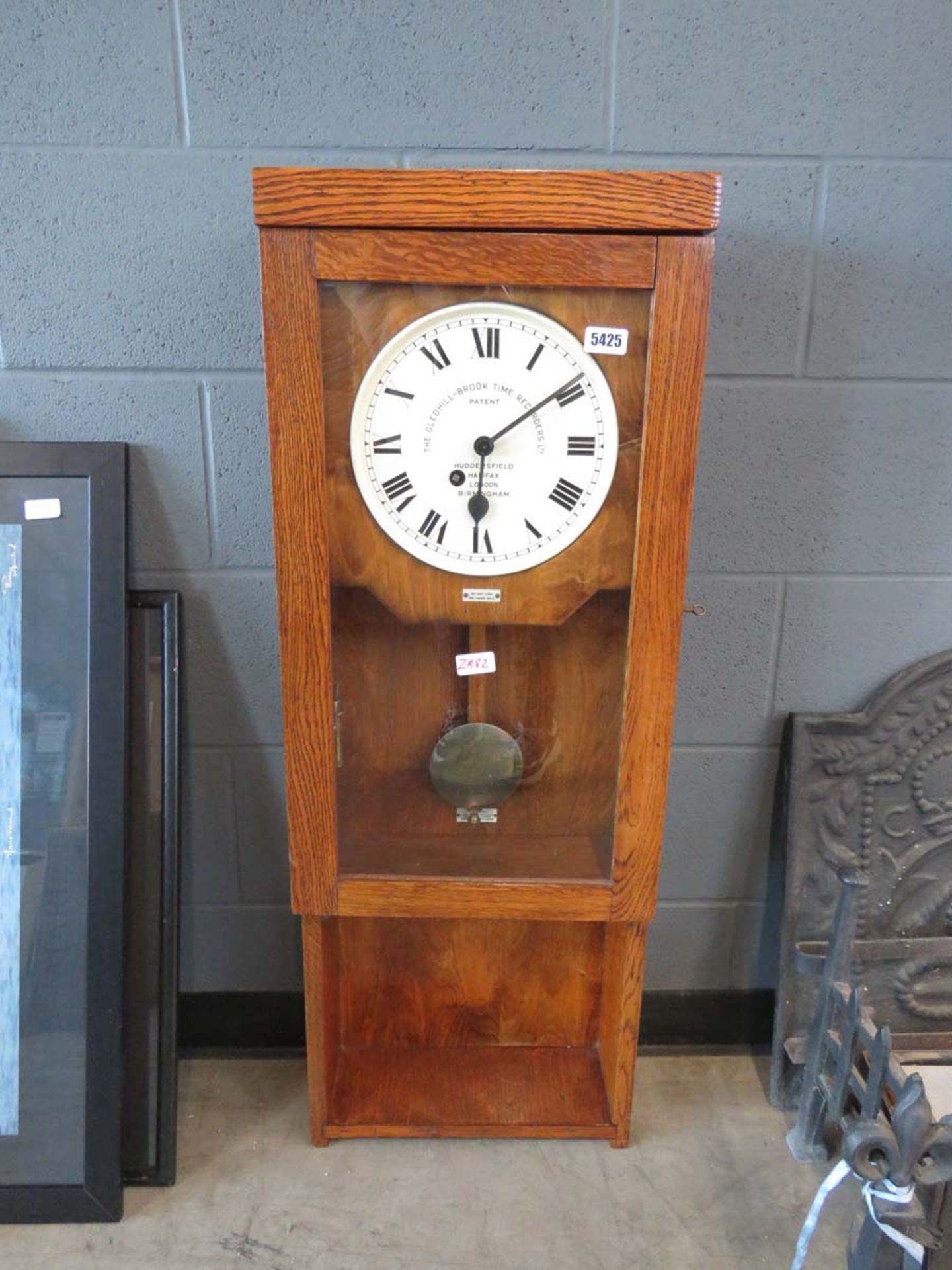 Oak cased time keepers clock