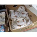 Box containing a large quantity of Sheridan pheasant patterned crockery