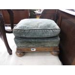 Green upholstered foot stool