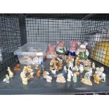Cage containing 4 Wade piggy banks and Wade Whimsies
