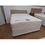 5ft double bed on divan base mattress with floral headboard