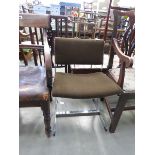 Brown fabric chair with chromed base