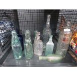 Cage containing Codd and other bottles