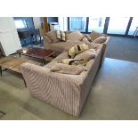 Brown fabric three seater sofa plus a matching two seater with scatter cushions