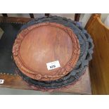 Quantity of caved wooded trays