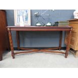 Reproduction mahogany hall table with x shaped stretcher