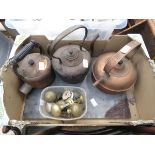 Box containing copper kettles and door handles