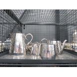 Cage containing 2 silver plated gallery trays and 4 piece tea service