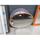 5030 - Oval mirror in rope twist frame and a quartz wall clock