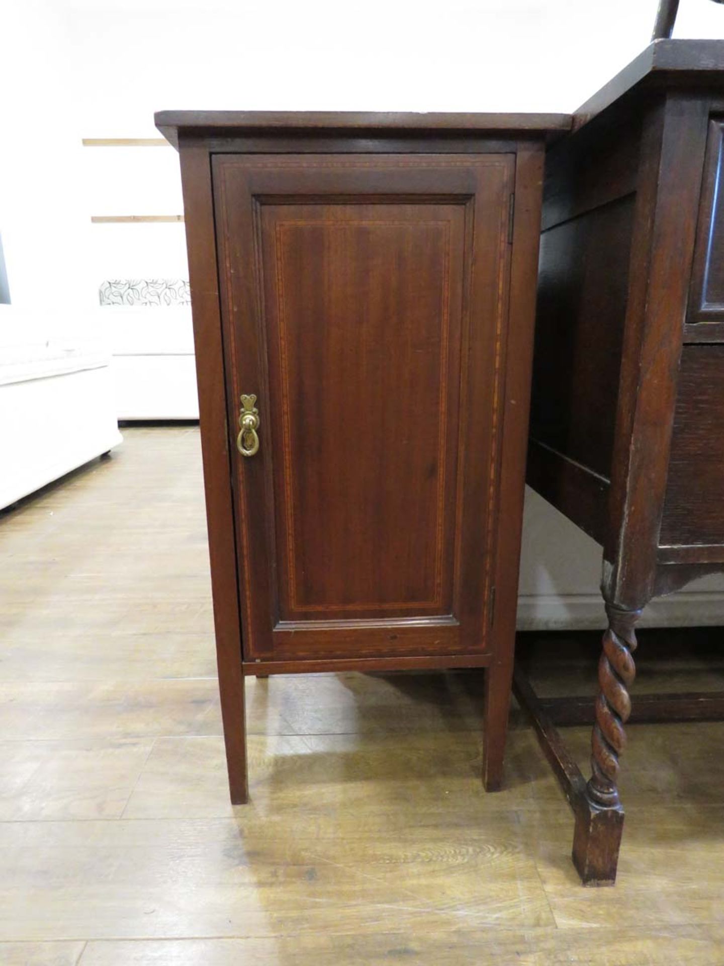 Pair of dark wood single door pot cupboards with inlaid top