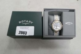 Rotary roman numeral dial watch with damaged strap and box