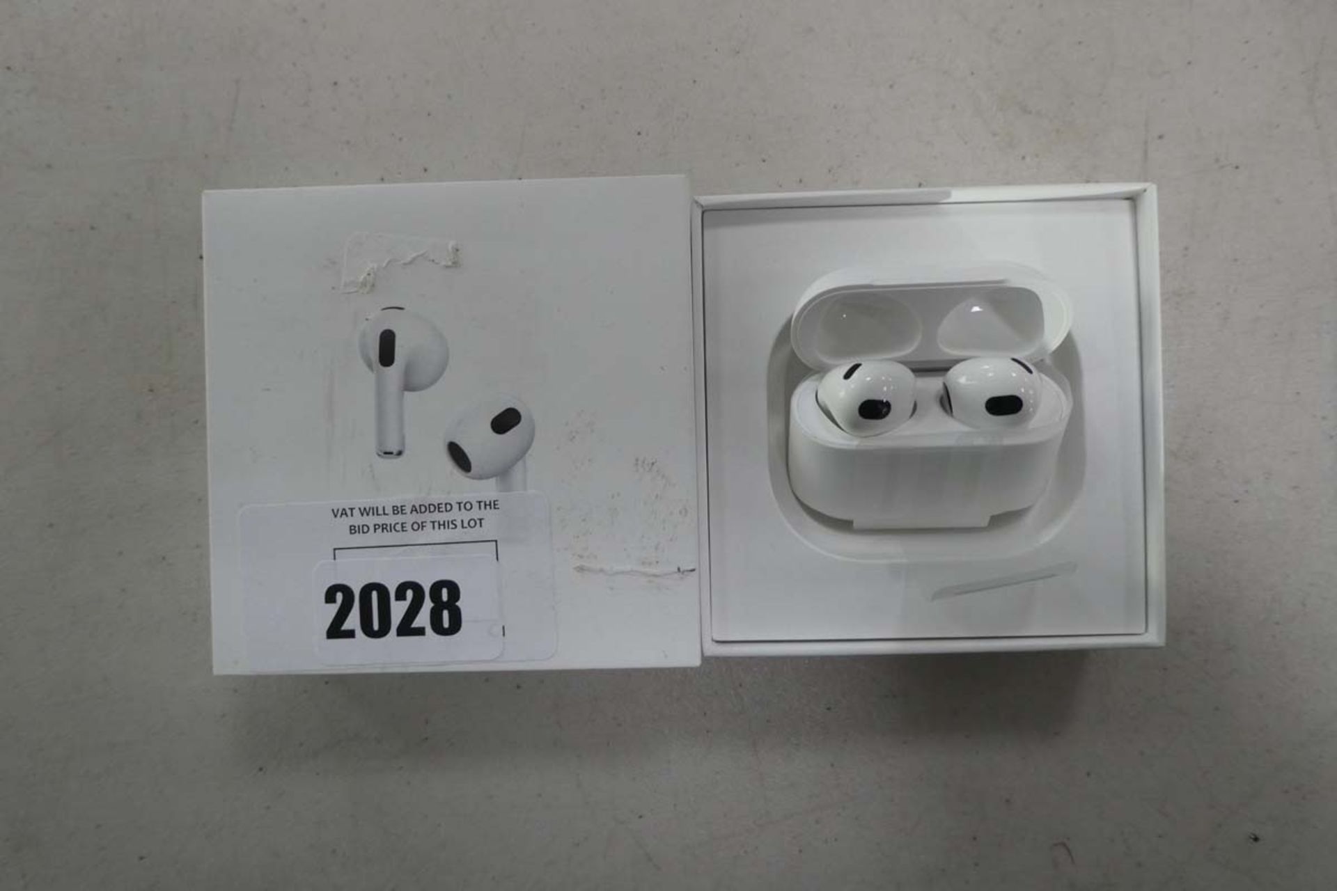 Apple AirPods 3rd generation with charging case in box