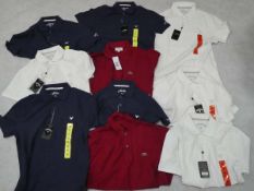 Selection of Callaway and Lacoste polo shirts in white, navy and red various sizes