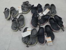 Selection of children's Crocs paired shoes in grey and navy various sizes