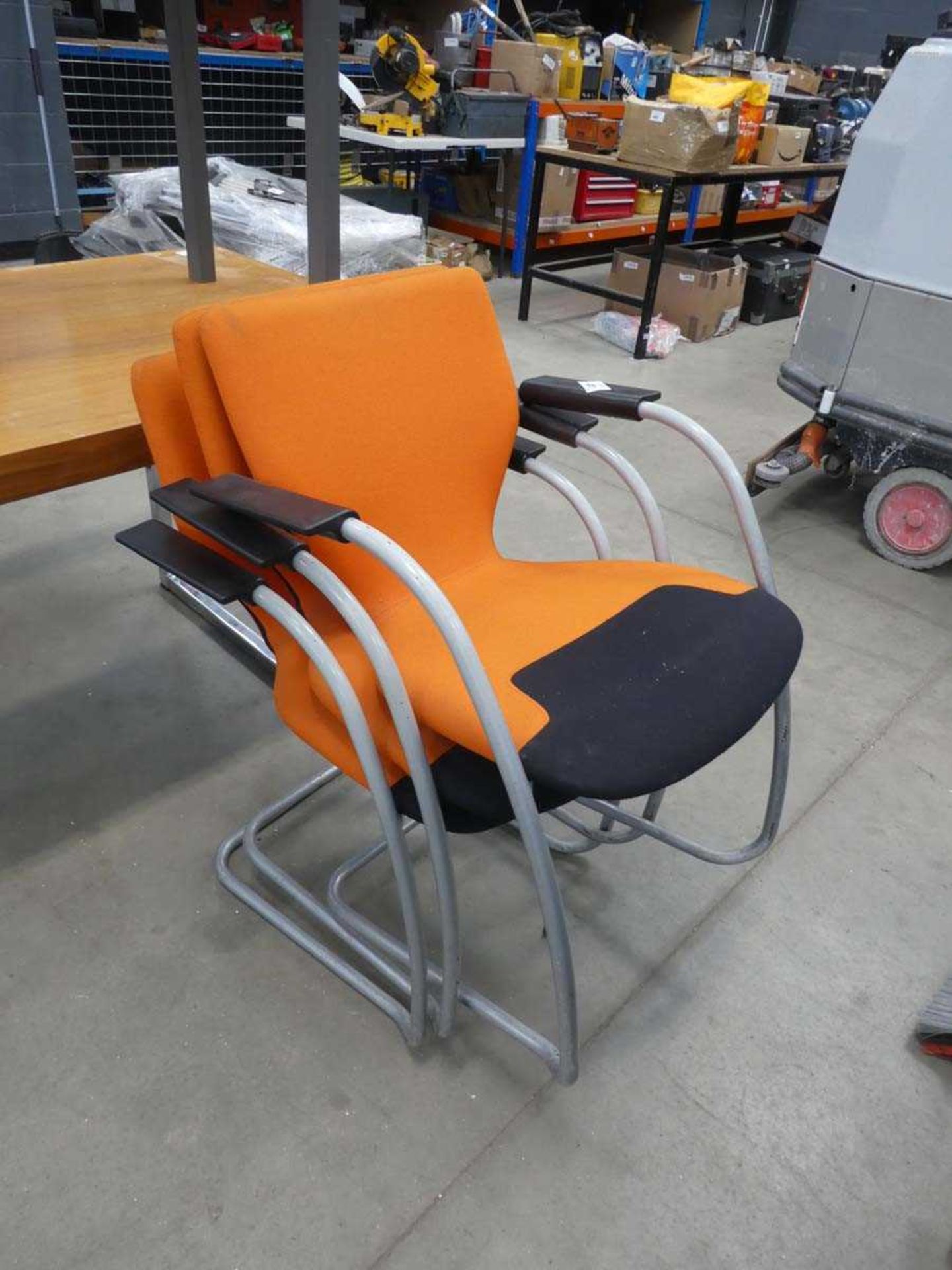 +VAT 3x orange stacking chairs