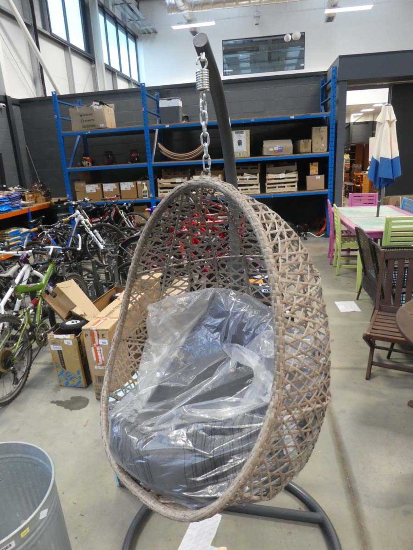 Rattan style hanging chair with frame