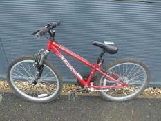 Small red Apollo childs mountain bike