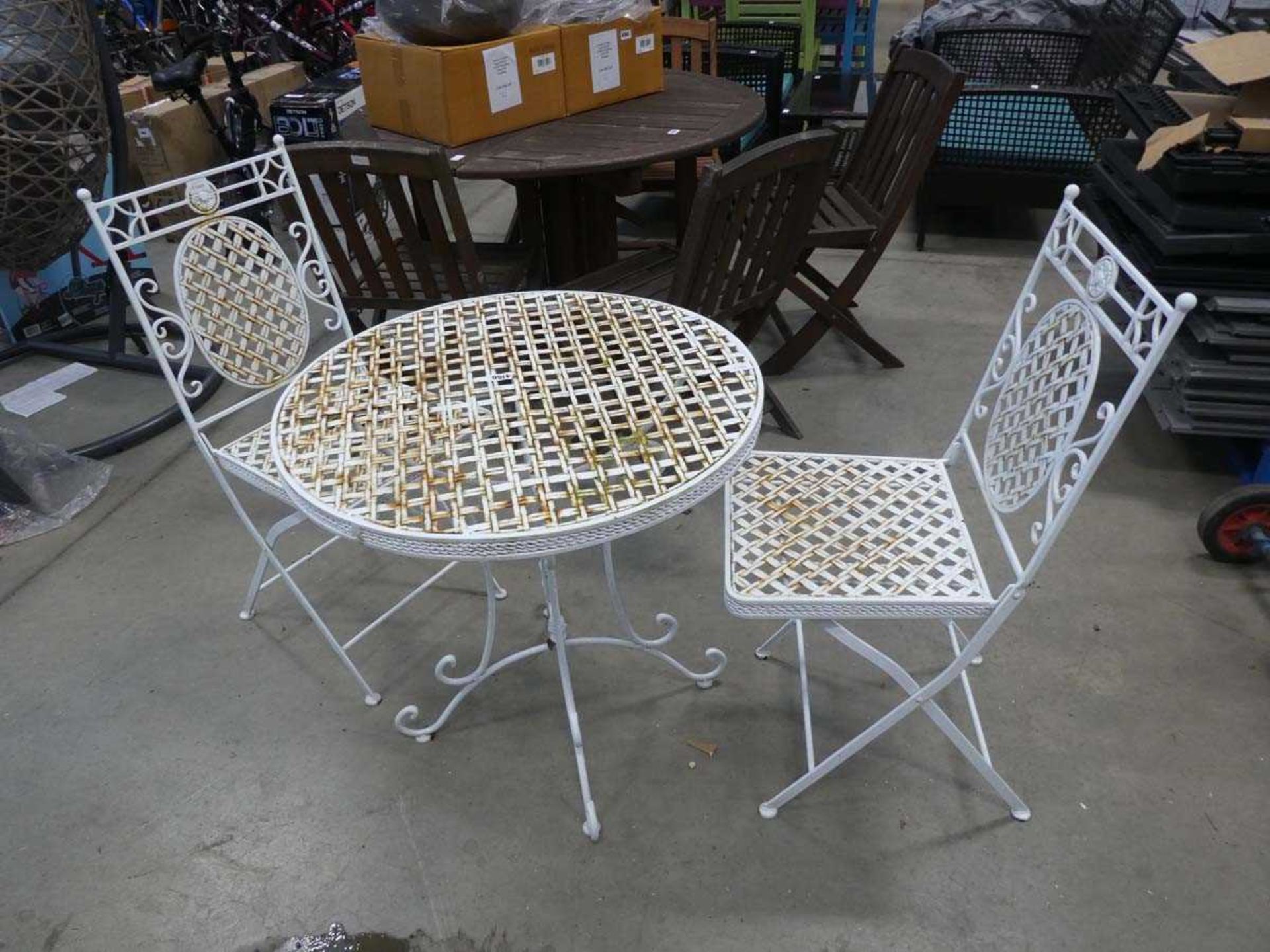 Metal round garden table and 2 folding chairs