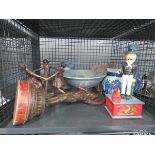 Cage containing spelter figures, pottery, blue and white jug and an American themed money box