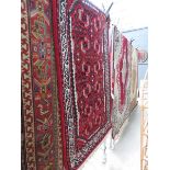 (7) Moroccan woolen carpet with red background and geometric pattern