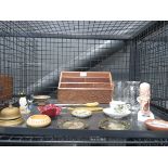 Cage containing a letter rack, brass bell, egg timer, etched glass, coffee cup and saucer, miniature