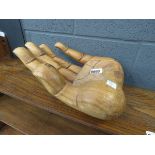 Carved wooden hand