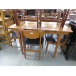 Teak extending table plus 4 matching chairs