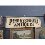 Painted antiques sign