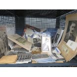 Cage containing military photographs and ephemera