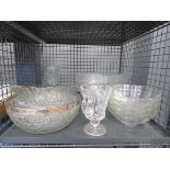 Cage containing a quantity of glass bowls and vases