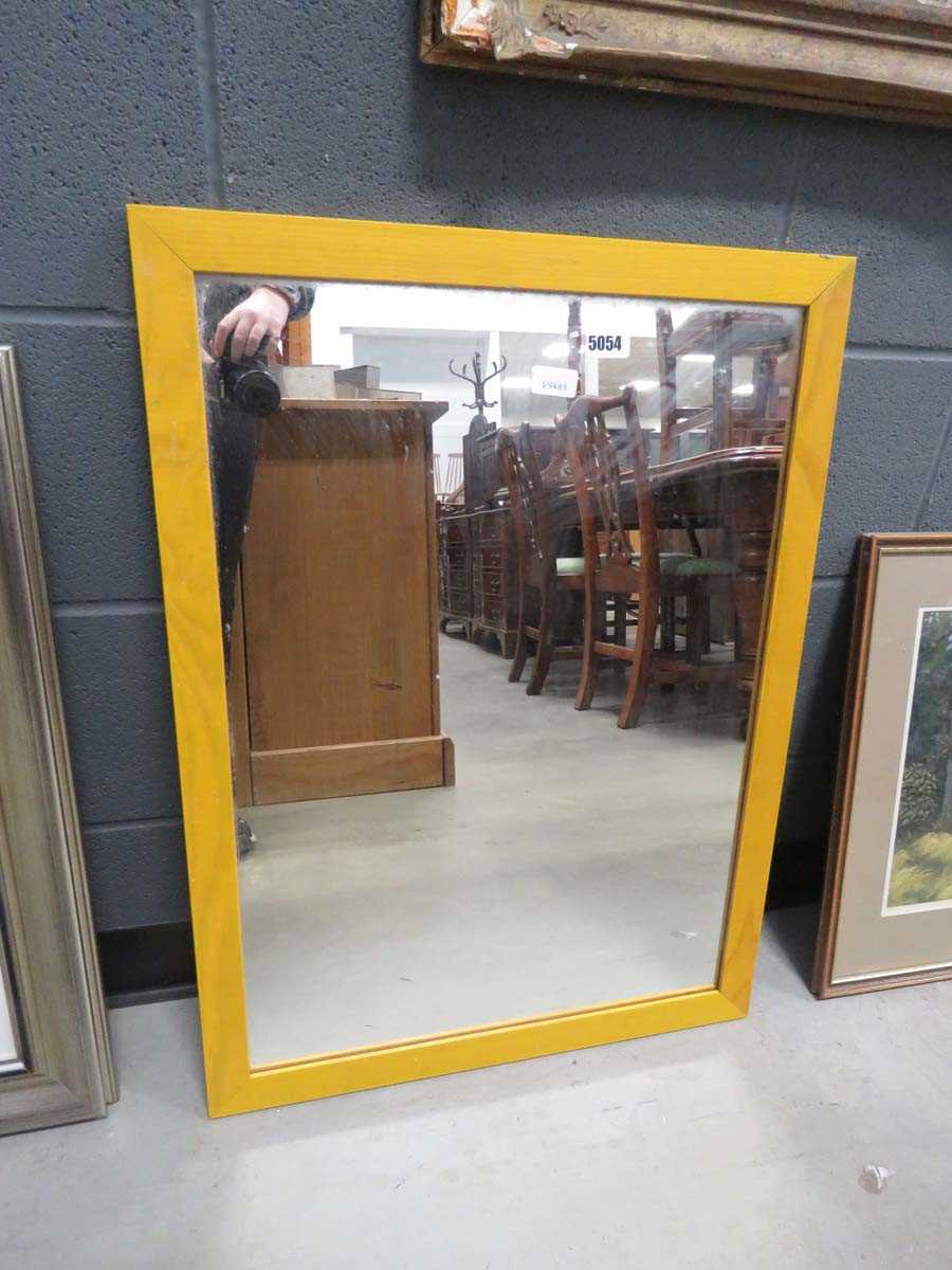 Rectangular mirror in yellow painted frame